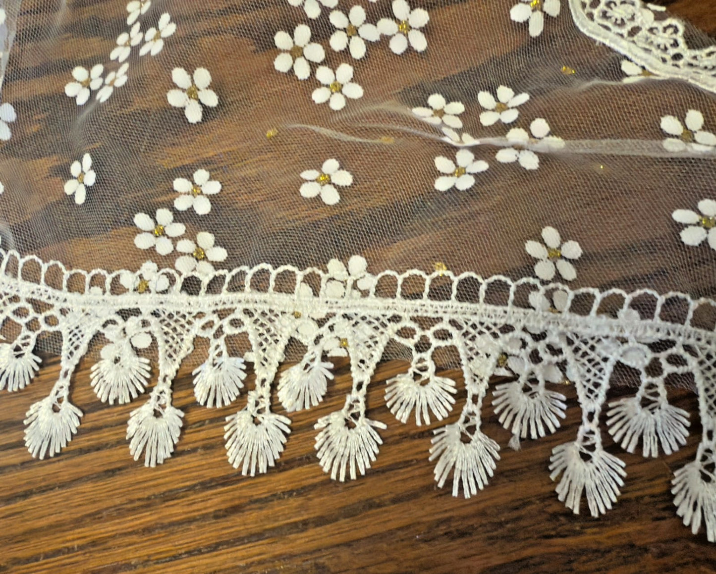 Women's white lace church veil with gold accents, featuring intricate lace detailing and elegant design for special occasions