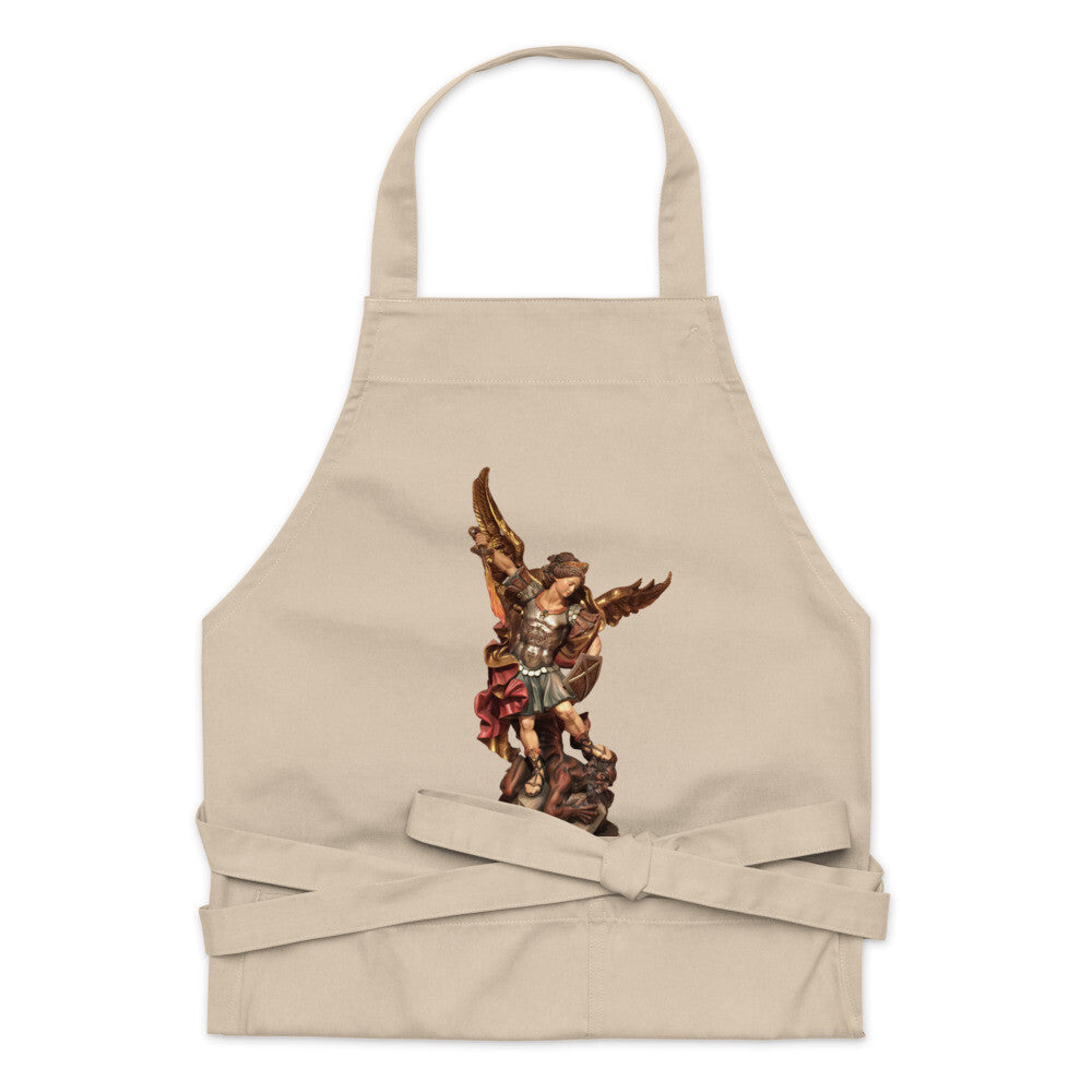Bob and Penny Lord Saint Michael organic cotton apron with a detailed religious design, ideal for kitchen and dining use.