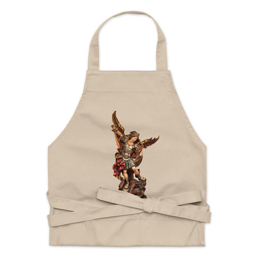 Bob and Penny Lord Saint Michael organic cotton apron with a detailed religious design, ideal for kitchen and dining use.