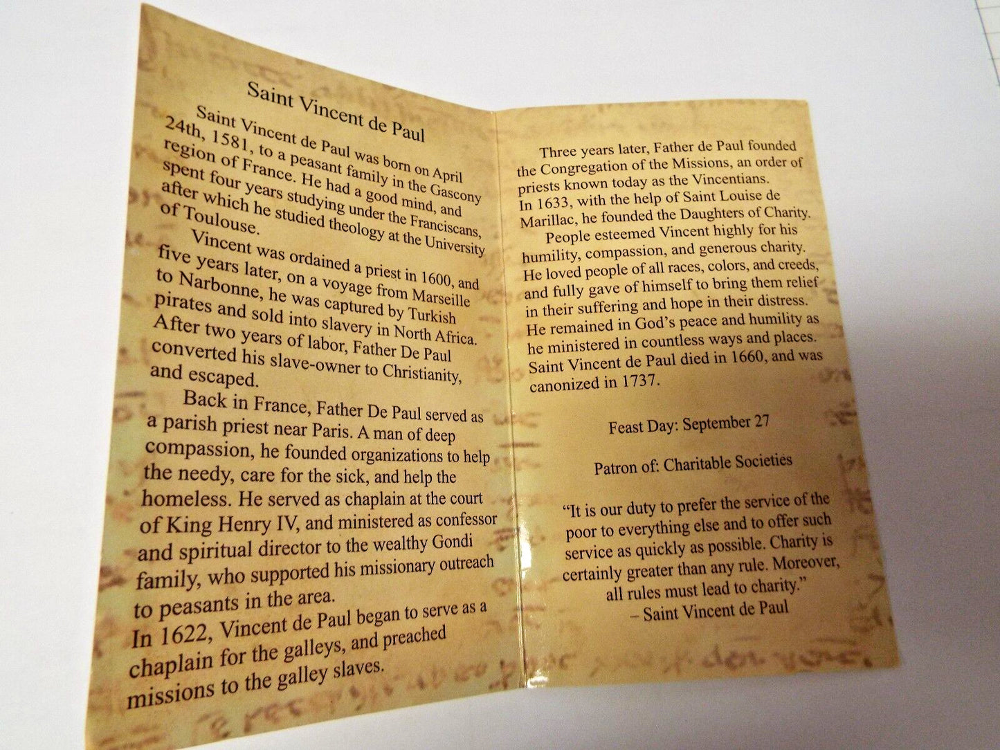 Saint Vincent de Paul biography and prayer folder with Holy Cards, featuring Christian spirituality by Bob and Penny Lord.