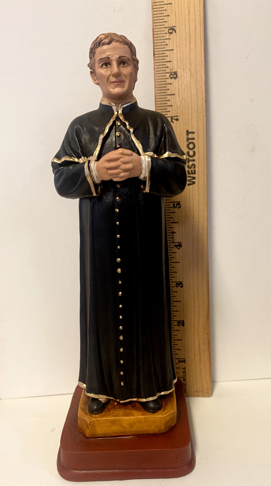 Saint John Bosco 8-inch religious statue by Bob and Penny Lord, depicting Don Bosco in a detailed, serene pose.