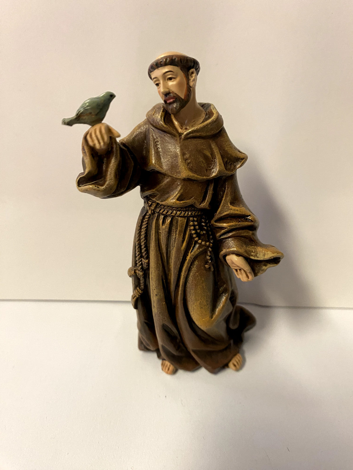 Small 4-inch Saint Francis of Assisi statue by Bob and Penny Lord, Christian collectible figurine with detailed craftsmanship.