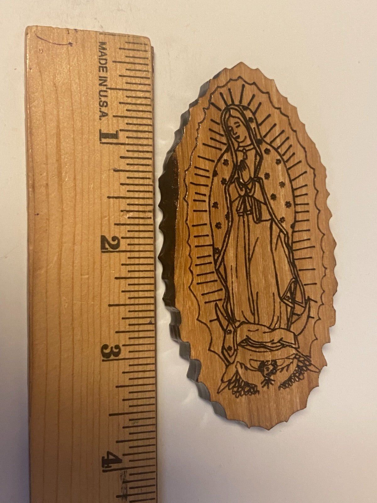 Olive wood magnet featuring Our Lady of Guadalupe, a Christian religious collectible with detailed image from Bethlehem.