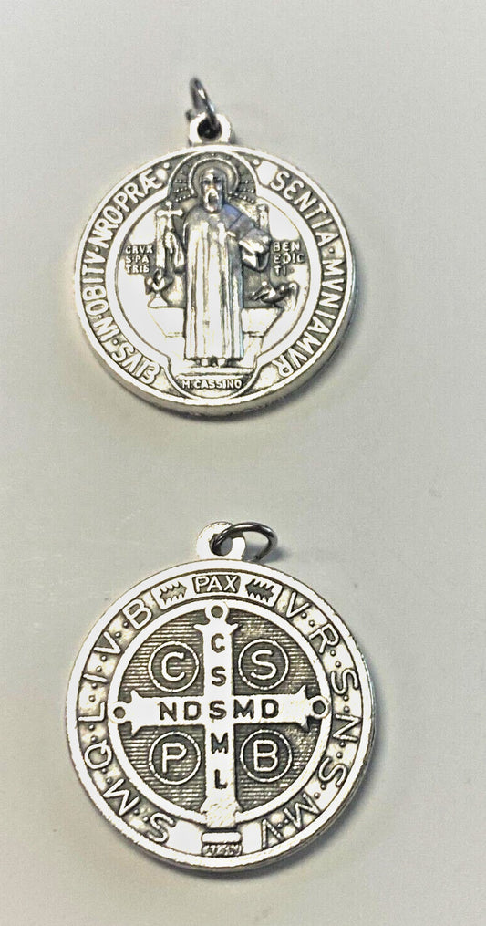 Silver tone Saint Benedict medal by Bob and Penny Lord, featuring religious symbols, new collectible Christian medal.
