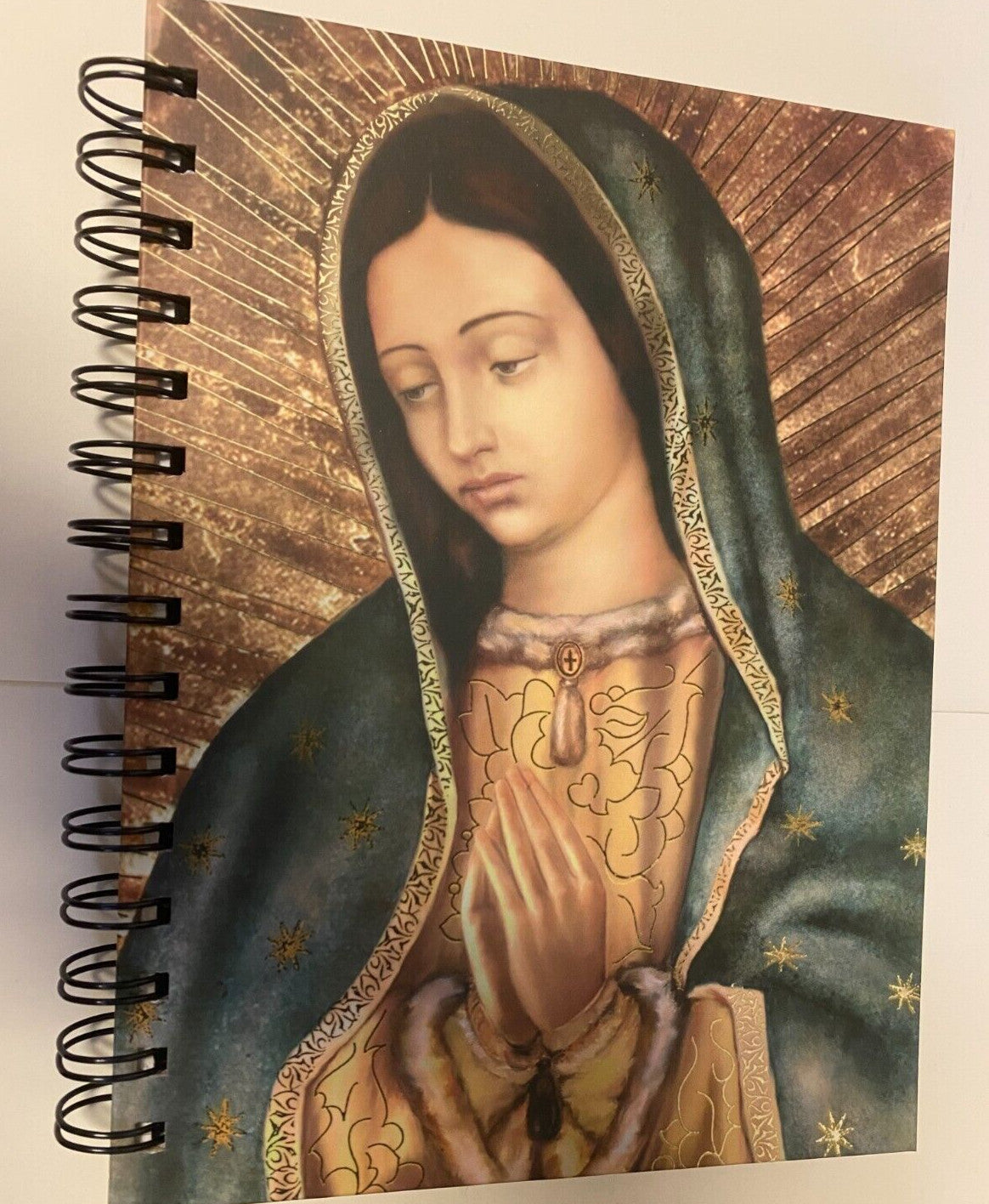 Hardcover journal featuring Our Lady of Guadalupe image, Christian spirituality, by Bob and Penny Lord, ideal for note-taking or reflection.