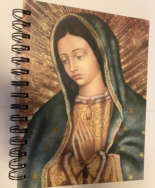 Hardcover journal featuring Our Lady of Guadalupe image, Christian spirituality, by Bob and Penny Lord, ideal for note-taking or reflection.