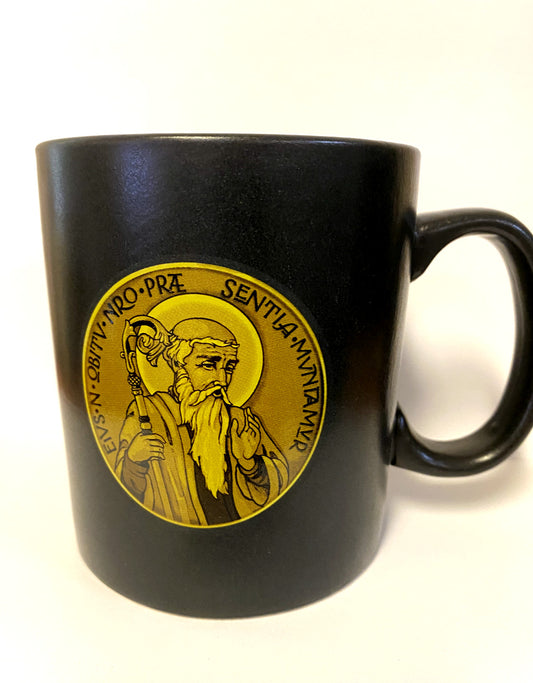 Saint Benedict 14 oz. ceramic mug featuring religious symbols, designed by Bob and Penny Lord, perfect for Christian collectibles.