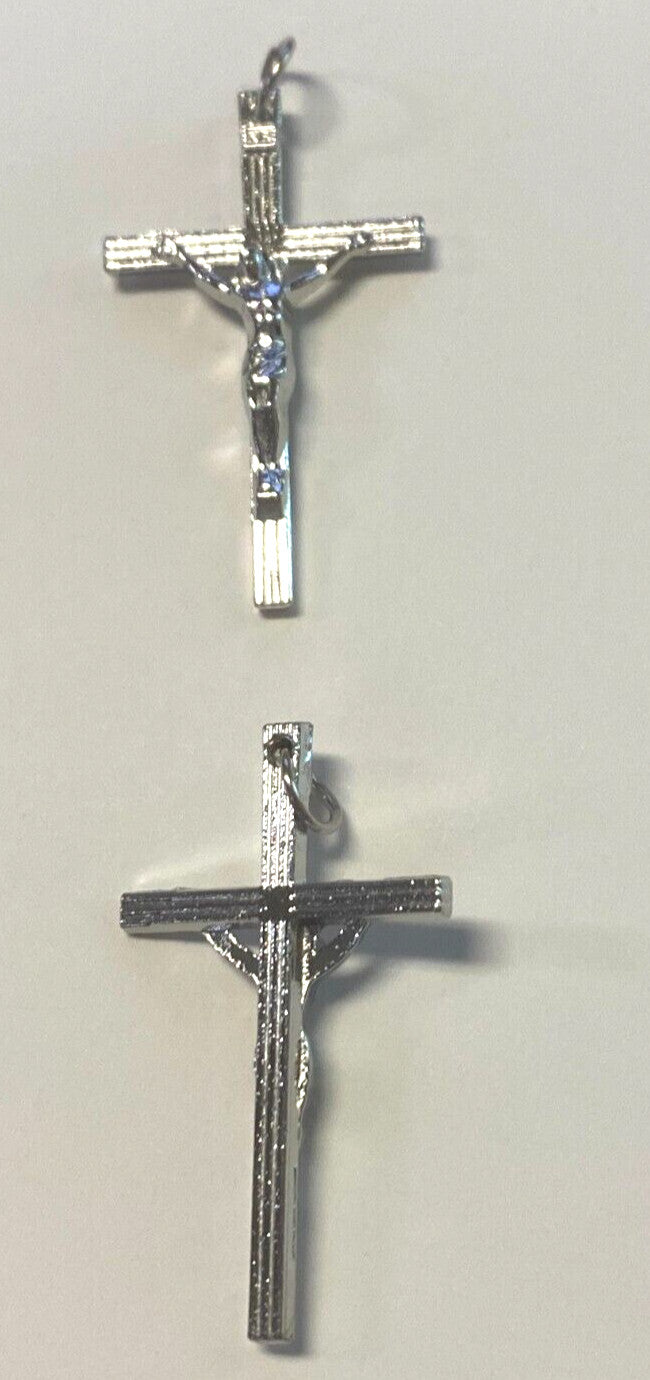 Silver plated 1.75-inch crucifix pendant with detailed Christian cross design, crafted by Bob and Penny Lord.