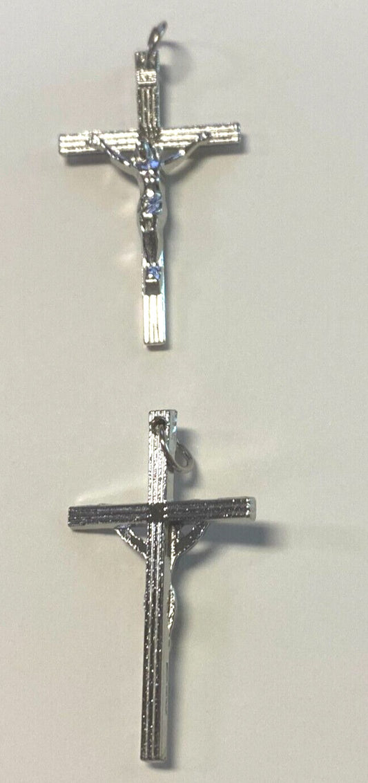 Silver plated 1.75-inch crucifix pendant with detailed Christian cross design, crafted by Bob and Penny Lord.