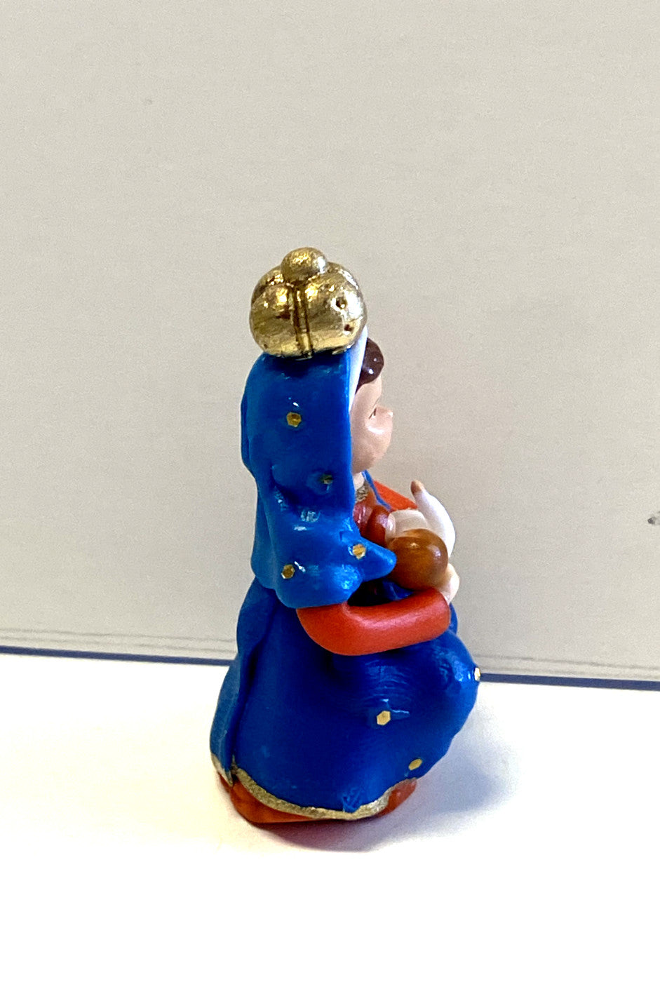 Miniature Our Lady of the Milk statue, 1.78 inches, depicting the Virgin Mary in a religious Christian collectibles figure from Colombia.