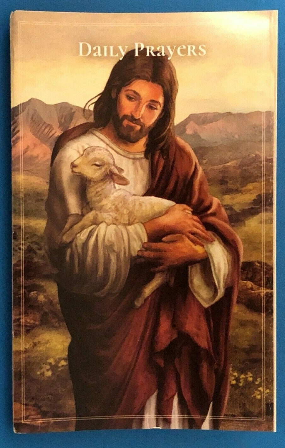 Daily Prayers pocket folder by Bob and Penny Lord featuring Christian holy cards for religious spirituality and collectible prayer resources.