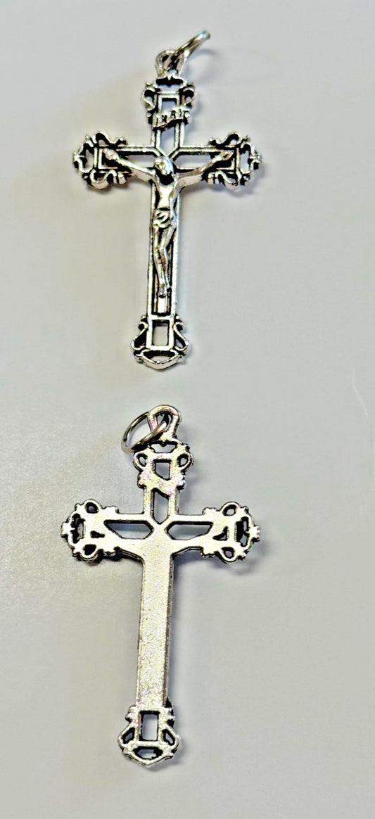 Silver plated Celtic Crucifix pendant, 1.75 inches, featuring detailed religious symbol, from Bob and Penny Lord collectibles.