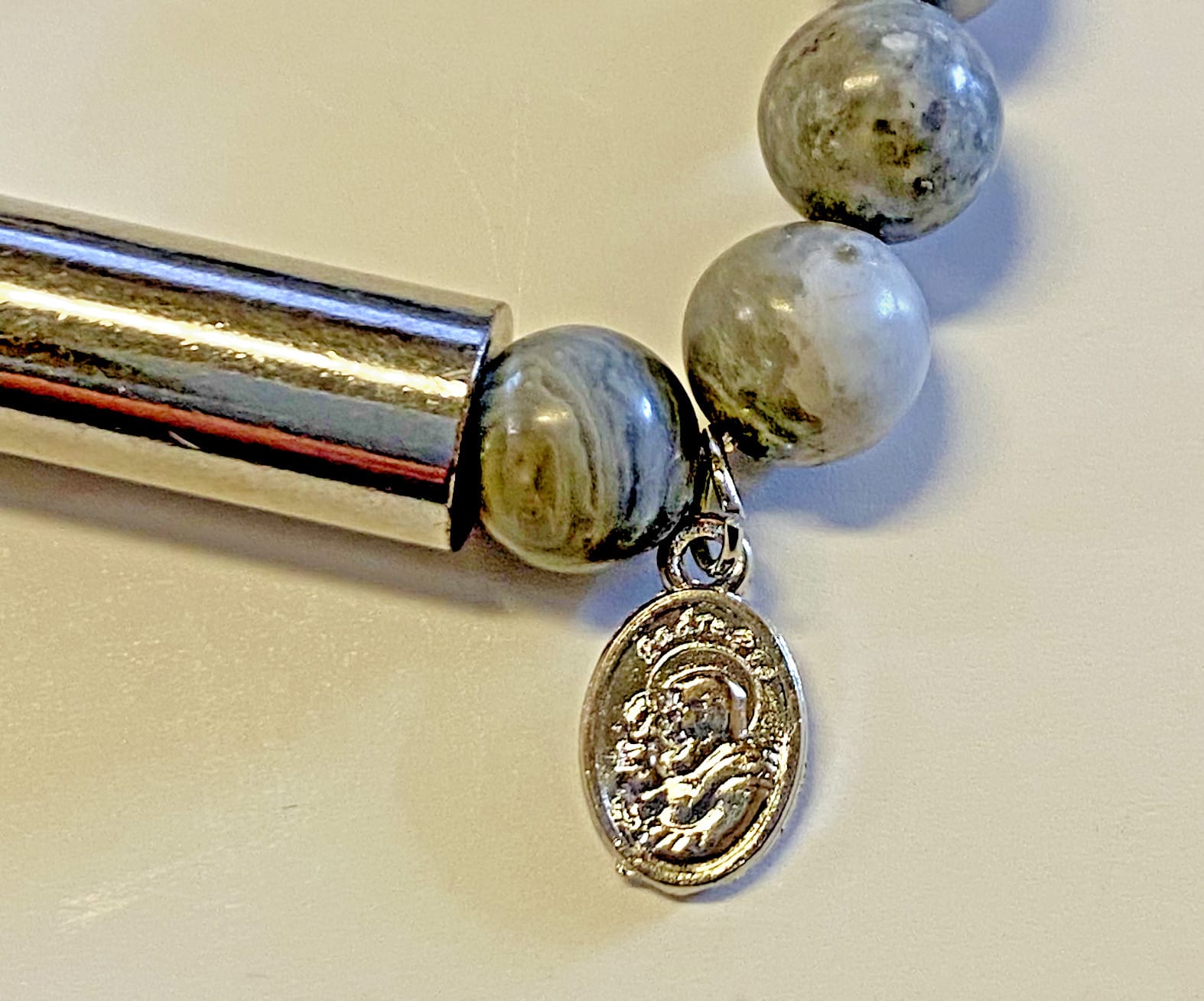 Padre Pio stone prayer bracelet by Journeys of Faith featuring a small charm, Christian jewelry for spirituality and devotion.