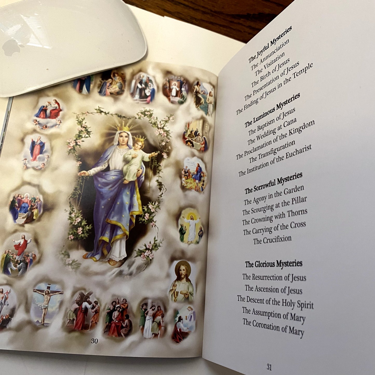 Paperback book titled "The Apparitions of Mary" by Bob and Penny Lord, featuring religious Christian imagery and spiritual themes.