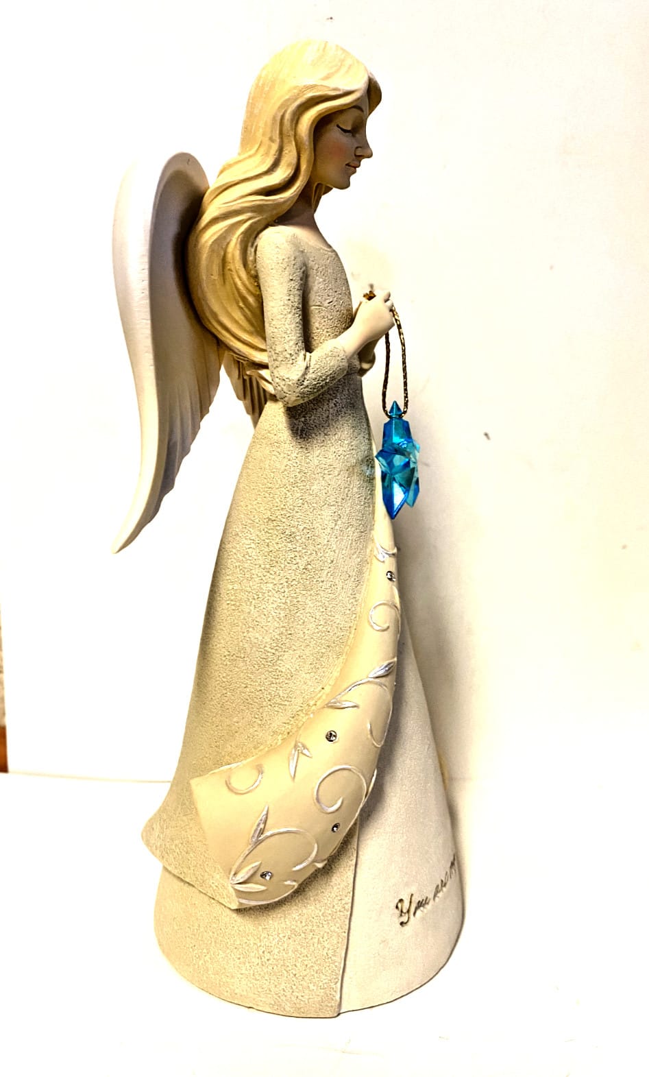 Enesco 7.5-inch "You Are My Star" angel figurine, decorative collectible sculpture with detailed angel design and star motif.
