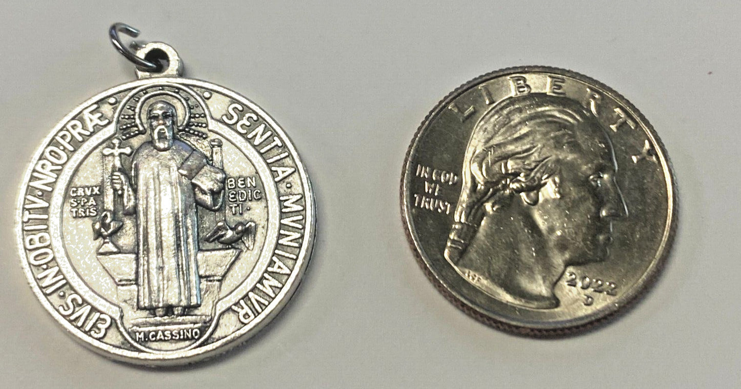 Silver tone Saint Benedict medal with religious design, collectible Christian medal by Bob and Penny Lord, new condition.