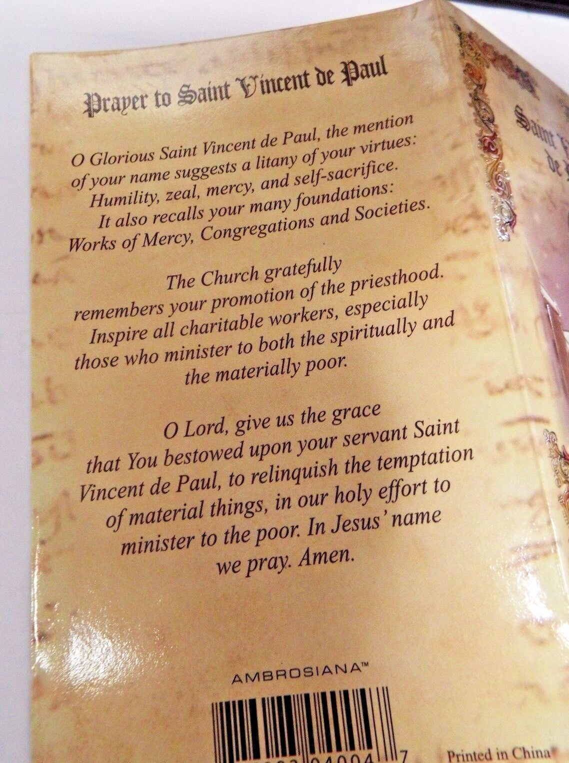 Saint Vincent de Paul biography and prayer folder from Bob and Penny Lord, featuring religious Christian Holy Cards and spiritual content.