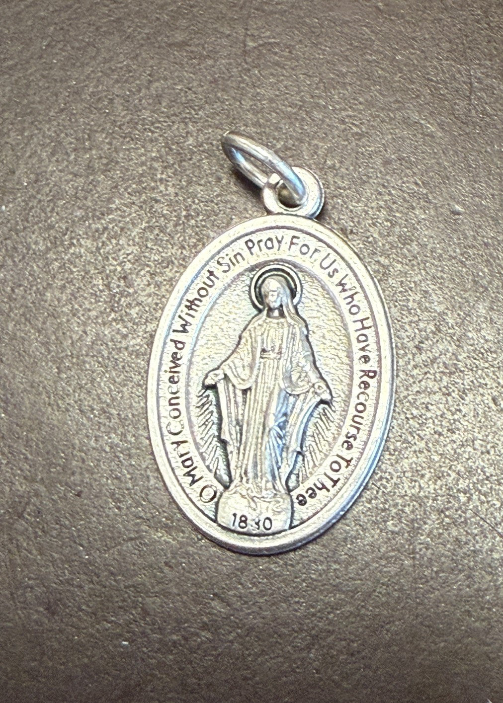 Silver tone Our Lady of the Miraculous medal, 1-inch Christian religious medal from Italy, featuring the Virgin Mary.