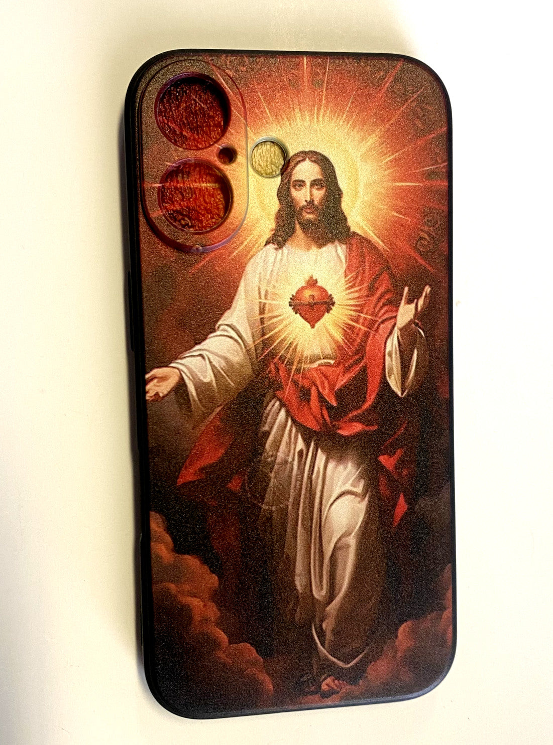 Sacred Heart of Jesus phone case for iPhone 14-16 by New Case, featuring religious artwork on durable cell phone cover.