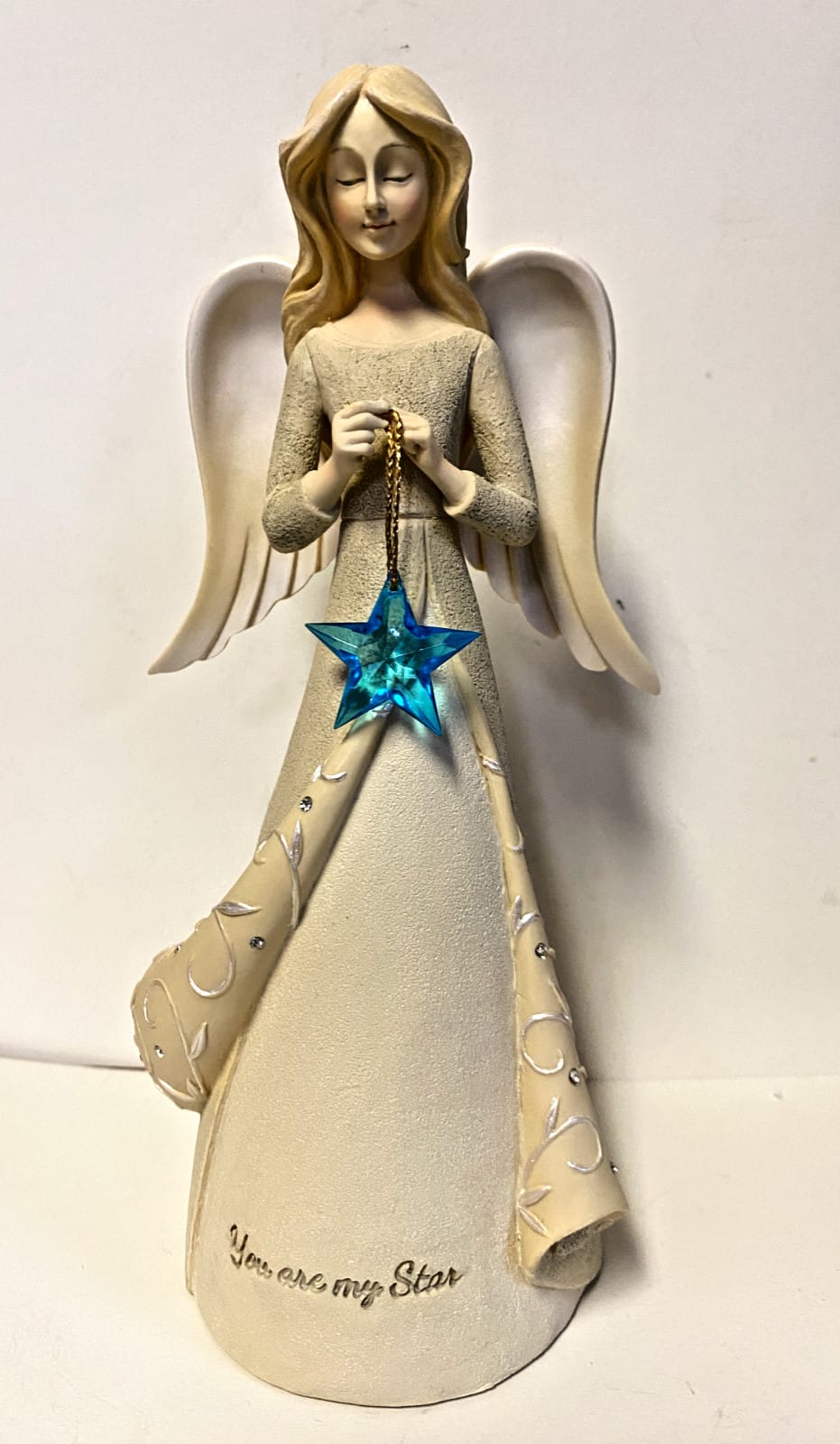 Enesco "You are my star" angel figurine, 7.5-inch decorative collectible sculpture with angel holding a star.