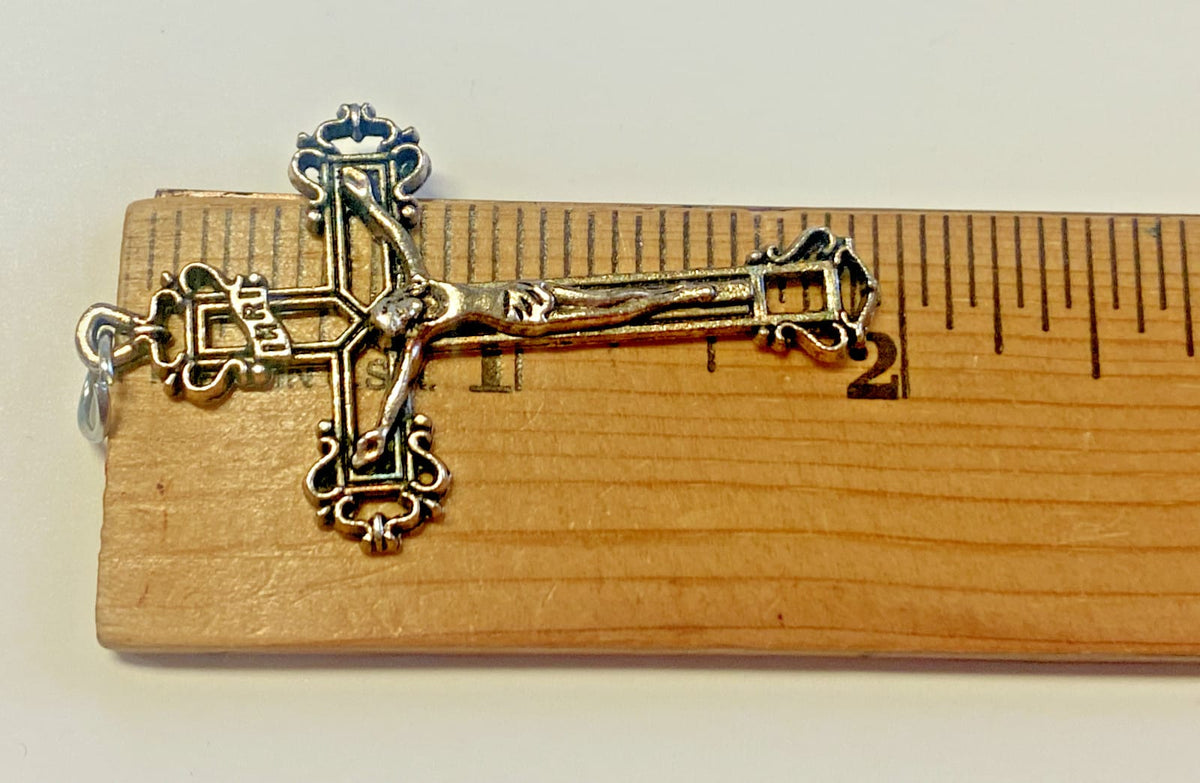 Ornate Christian crucifix pendant by Journeys of Faith, detailed religious jewelry with intricate design for spiritual symbolism.