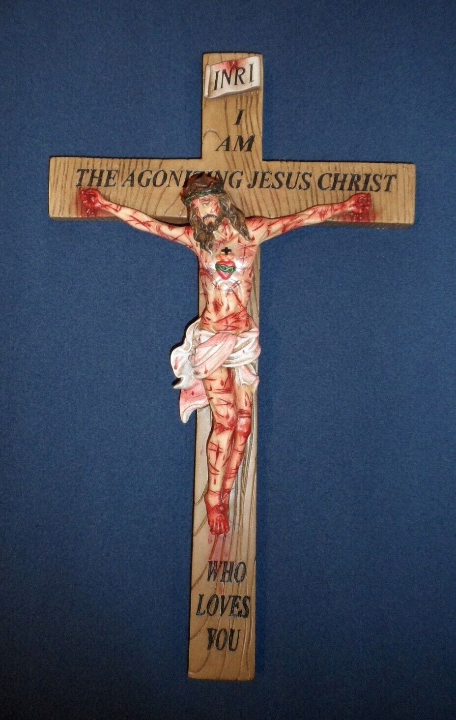 Wooden 17-inch Crucifix by Bob and Penny Lord featuring the Most Precious Blood, a religious Christian cross collectible.
