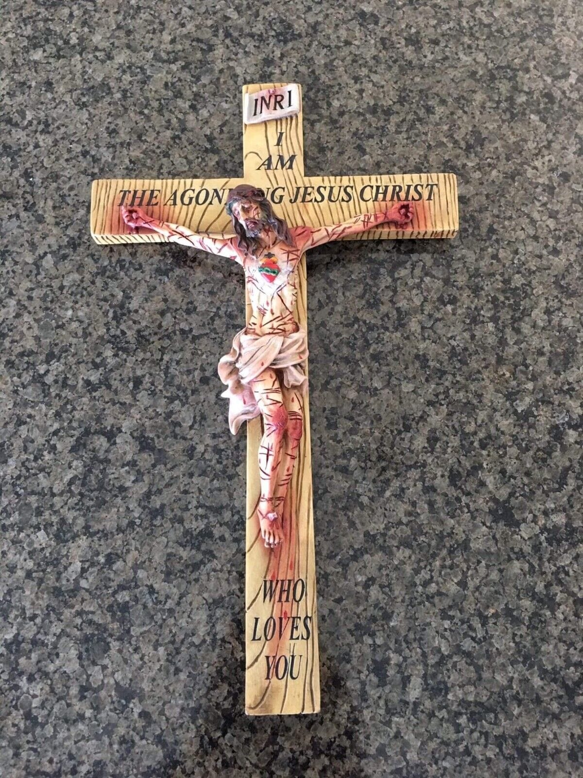 17-inch Christian crucifix from Bob and Penny Lord, featuring the Most Precious Blood, showcasing detailed religious craftsmanship.