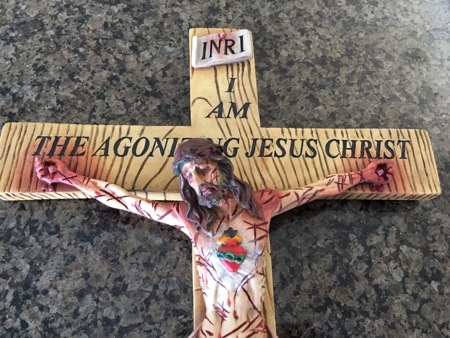 17-inch Christian crucifix by Bob and Penny Lord featuring the Most Precious Blood, made of collectible religious material.