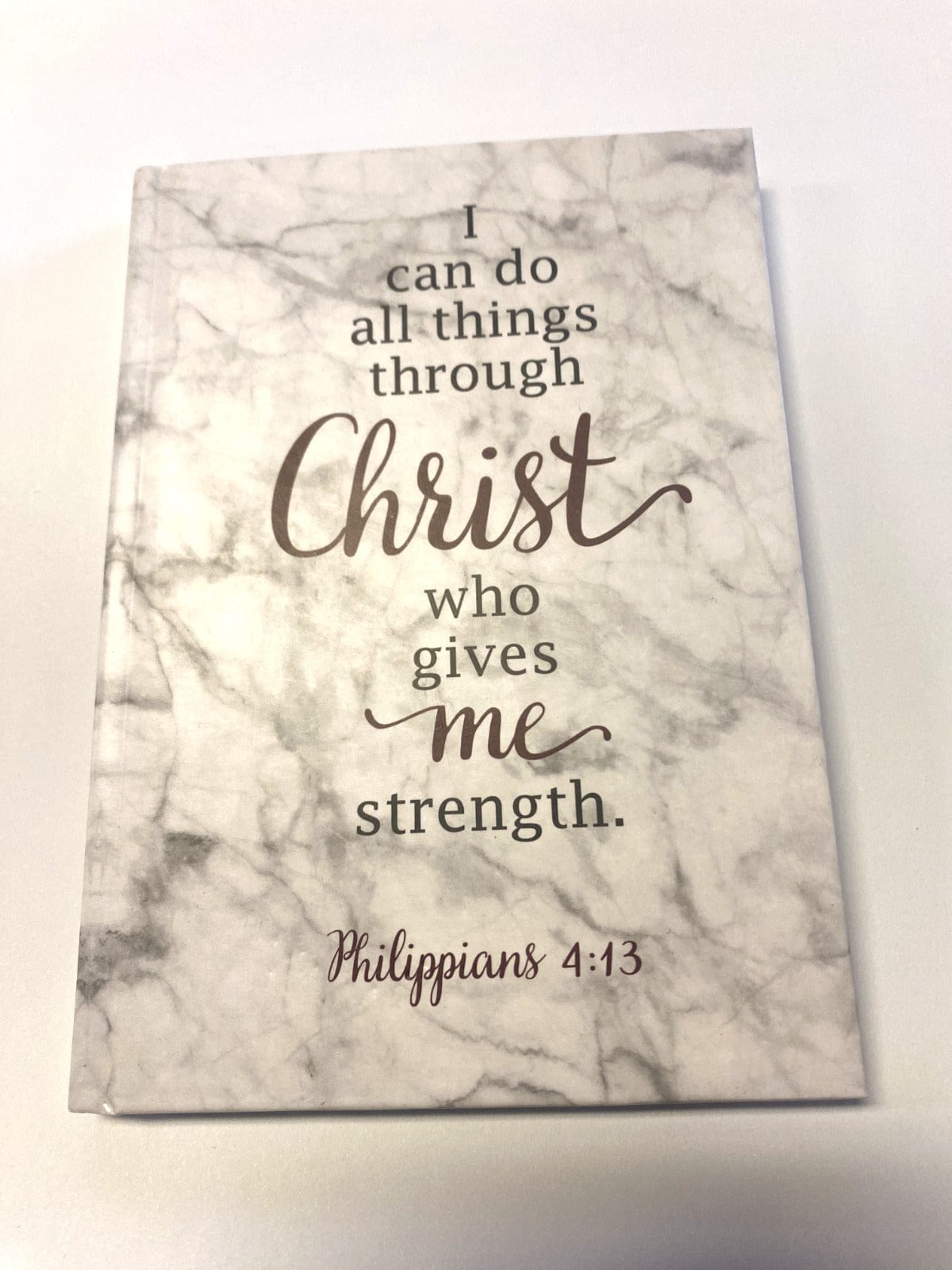 Hardcover Christian journal titled "I Can Do All Things through Christ" by Bob and Penny Lord, featuring spiritual design on cover.