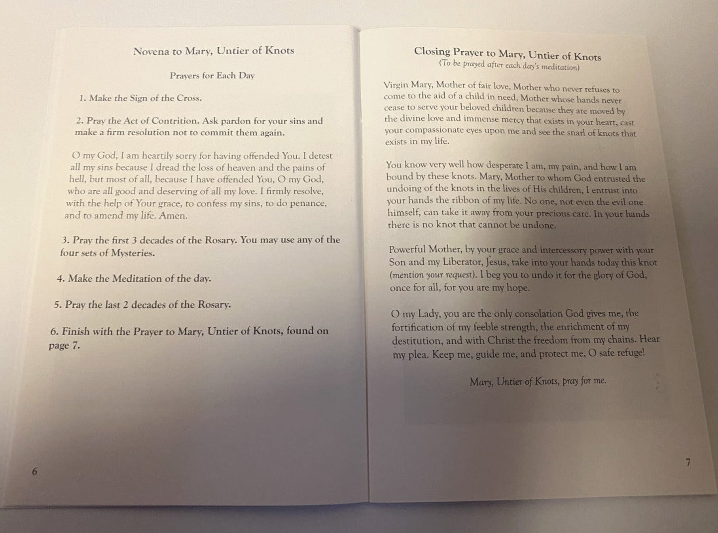 Our Lady Undoer of Knots prayer book from Bob and Penny Lord, featuring religious holy card design with Christian spiritual imagery.