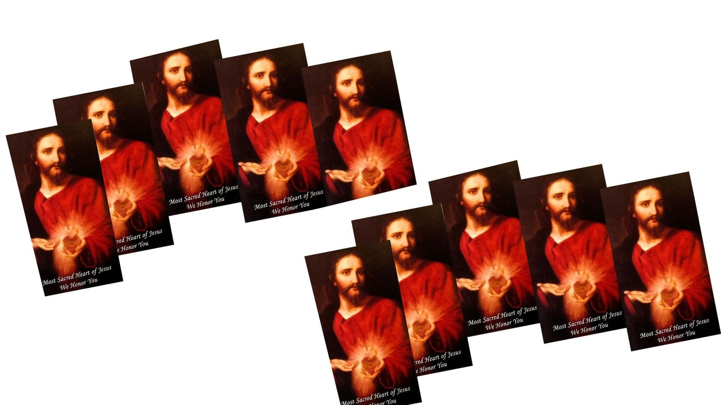 Set of 10 Sacred Heart prayer cards by Bob and Penny Lord featuring religious artwork and prayer text on each card.