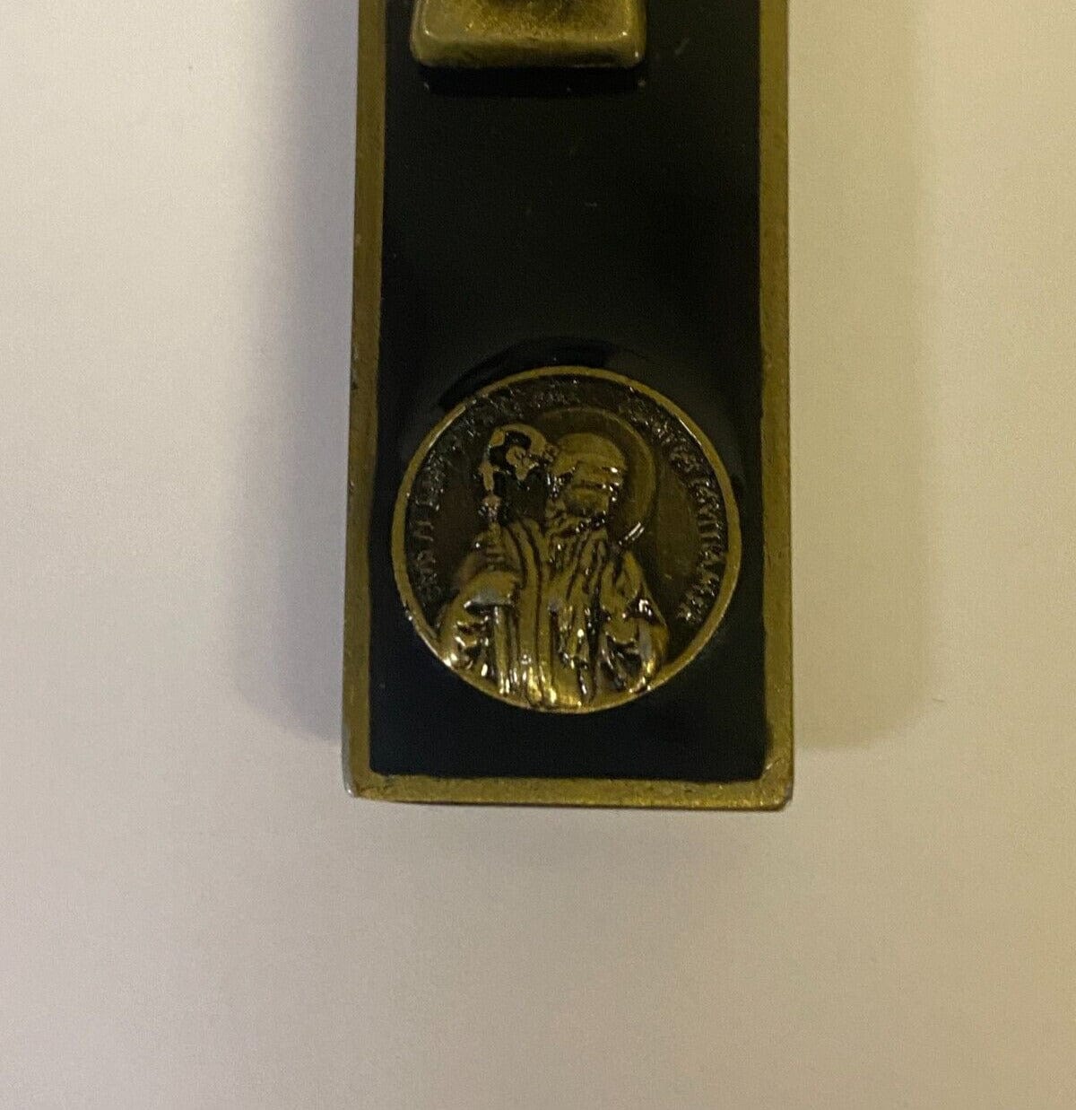 Saint Benedict black and bronze dual coin cross collectible, featuring intricate religious design with Christian symbolism.