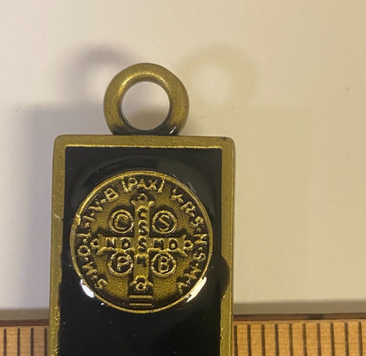 Saint Benedict black and bronze dual coin cross collectible by Bob and Penny Lord, featuring intricate religious design and craftsmanship.