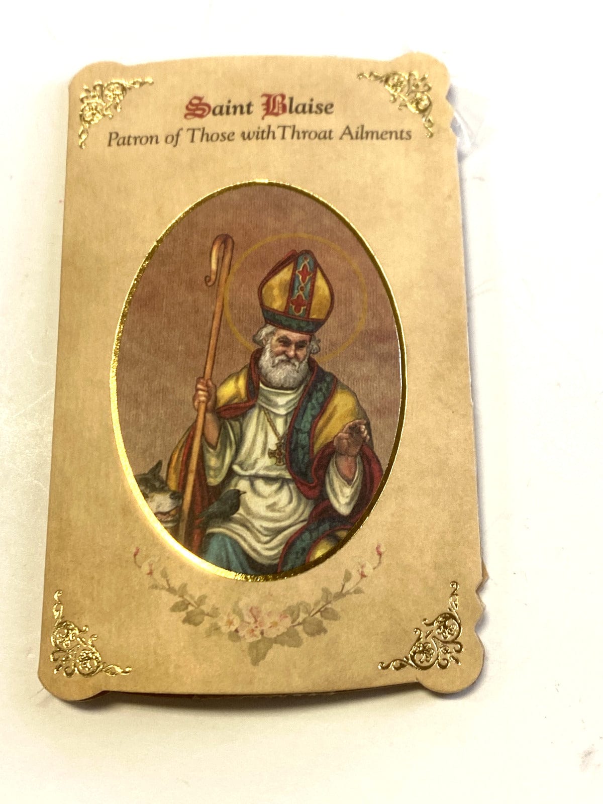 Saint Blaise Prayer folder with medal from Bob and Penny Lord, featuring Christian holy card design for religious devotion.