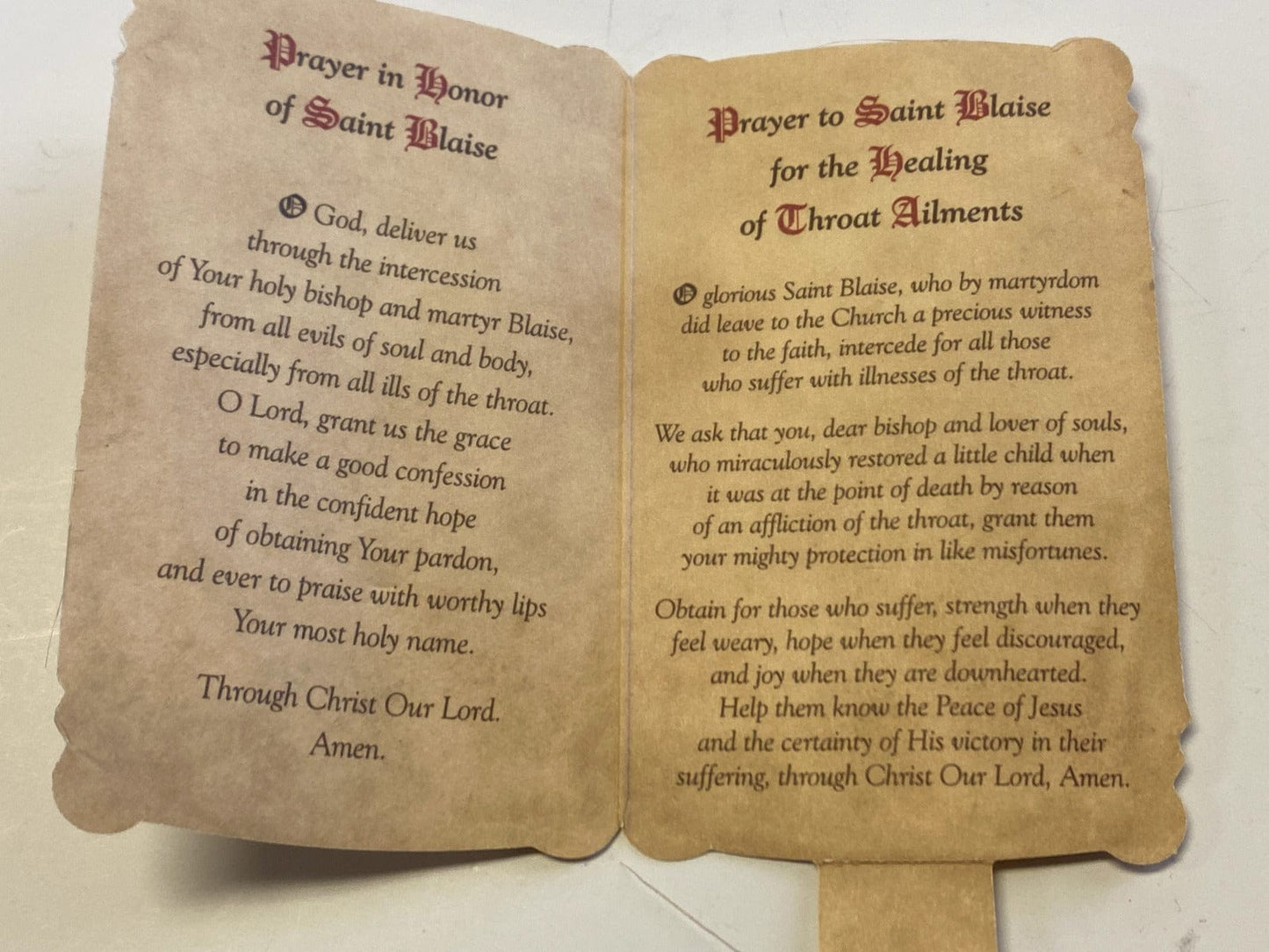 Saint Blaise prayer folder with medal, Christian religious Holy Card by Bob and Penny Lord, featuring sacred imagery and prayer.