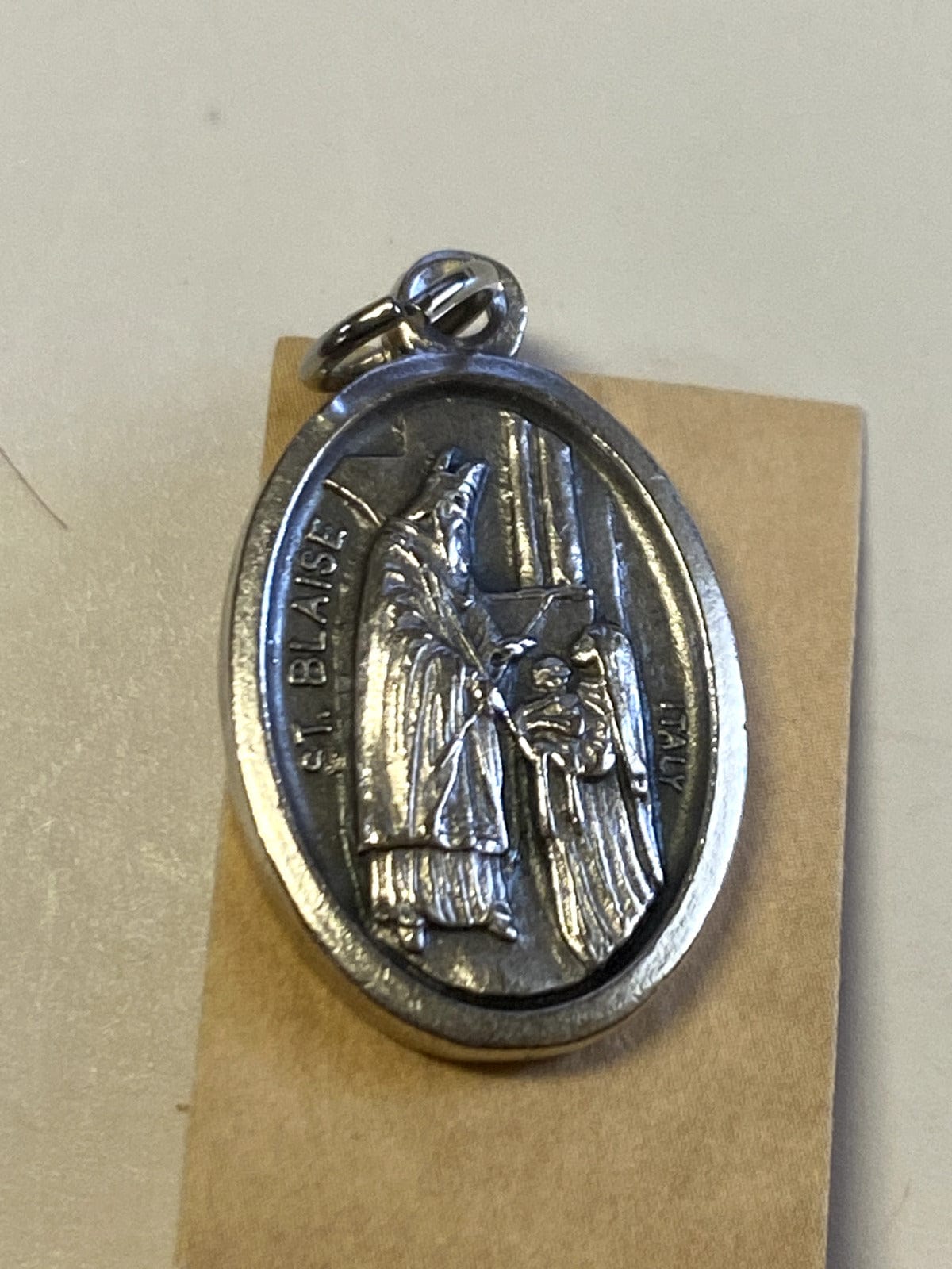 Saint Blaise prayer folder with medal from Bob and Penny Lord, featuring religious Christian Holy Card design.