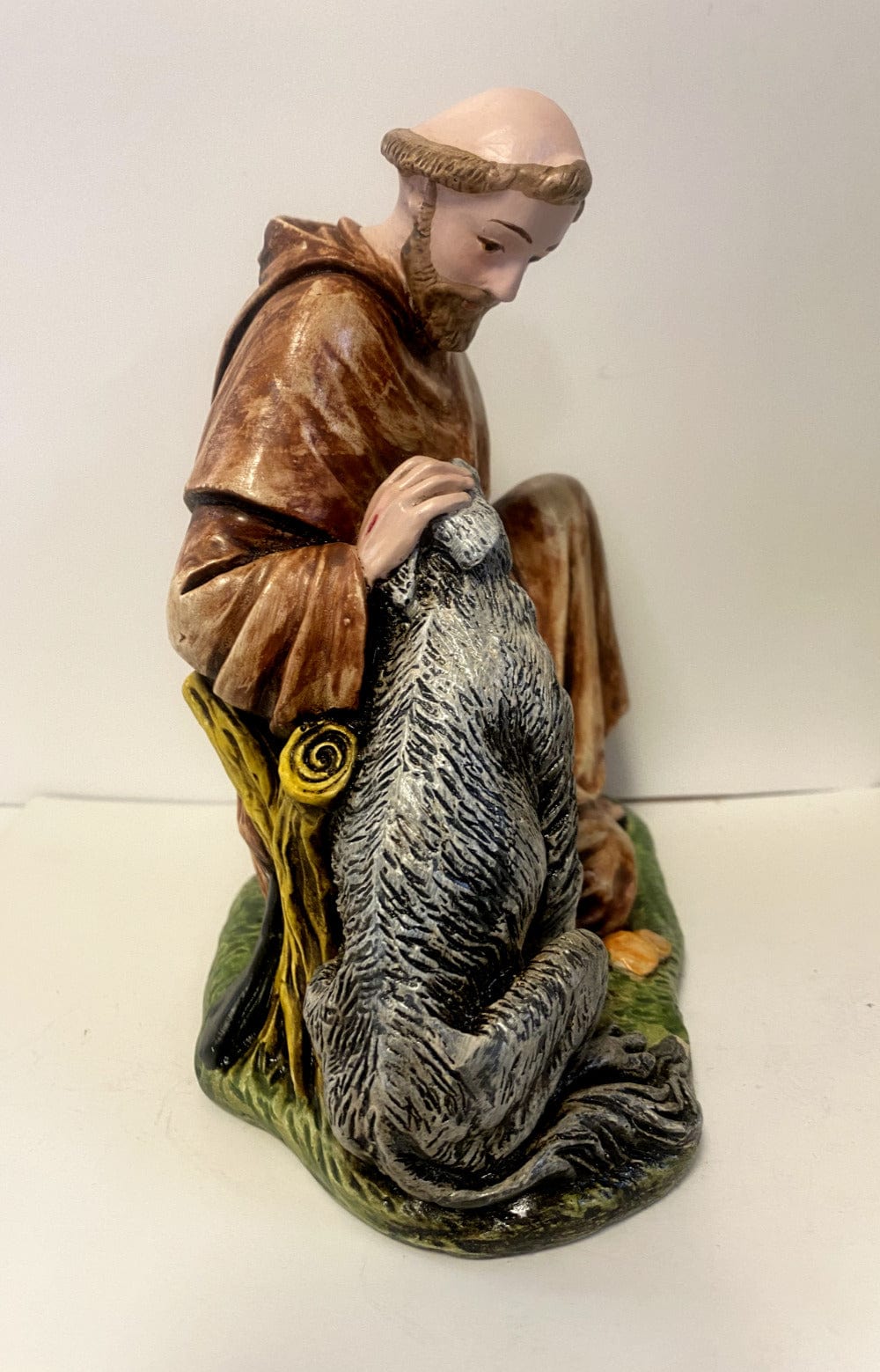 Saint Francis of Assisi with wolf 6.5-inch collectible statue by Bob and Penny Lord, depicting Saint with wolf in a detailed Christian figurine