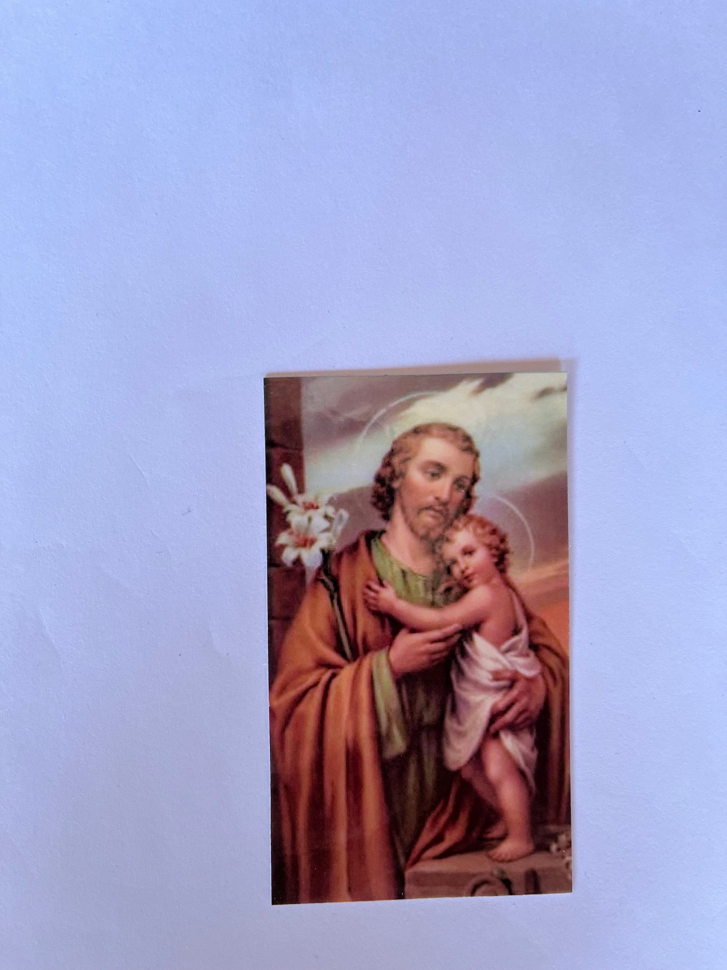 Saint Joseph prayer card from Bob and Penny Lord, featuring religious imagery and Christian holy card design.