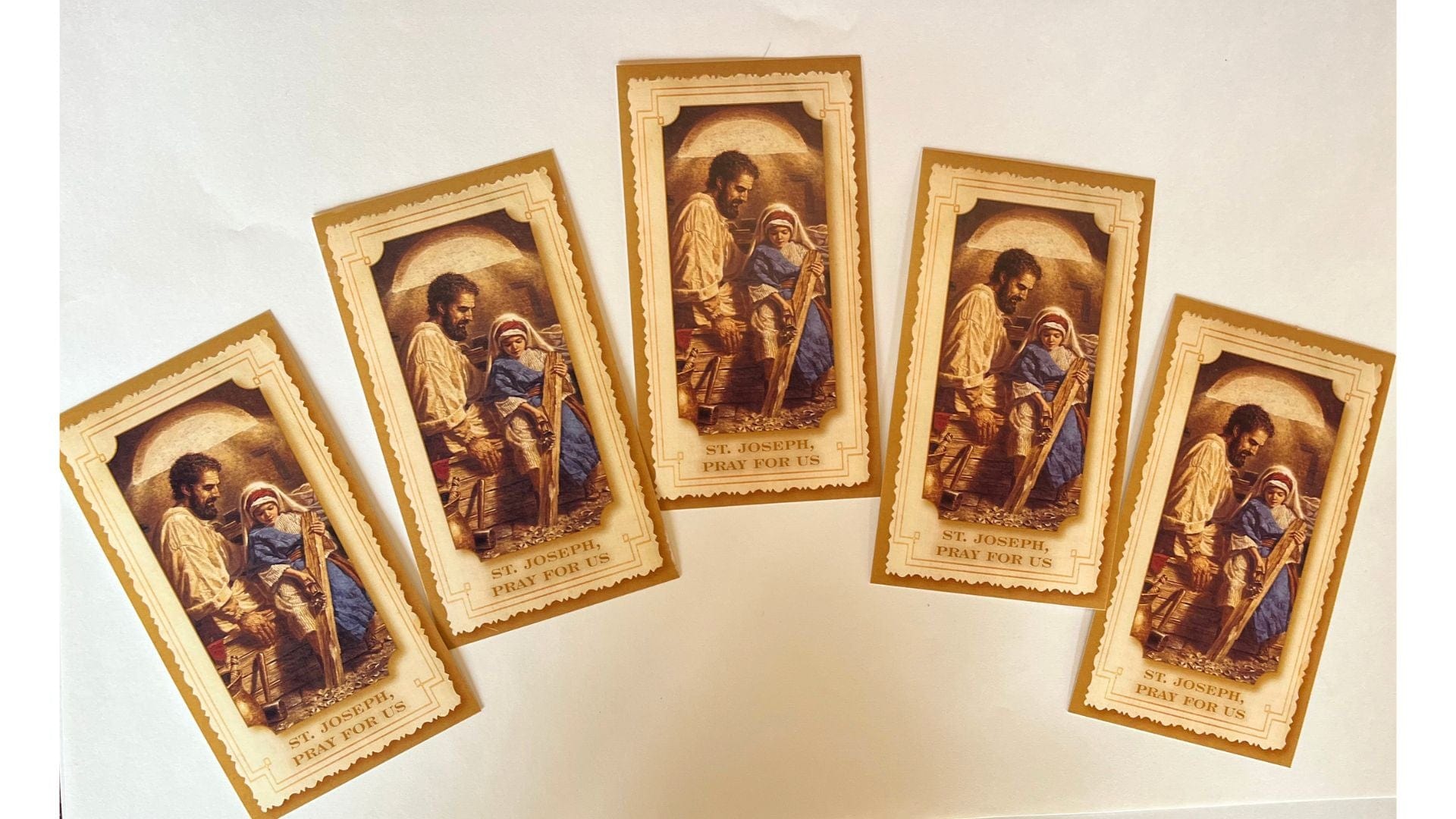 Set of five Saint Joseph prayer cards with novenas by Bob and Penny Lord, featuring religious imagery and prayer text.