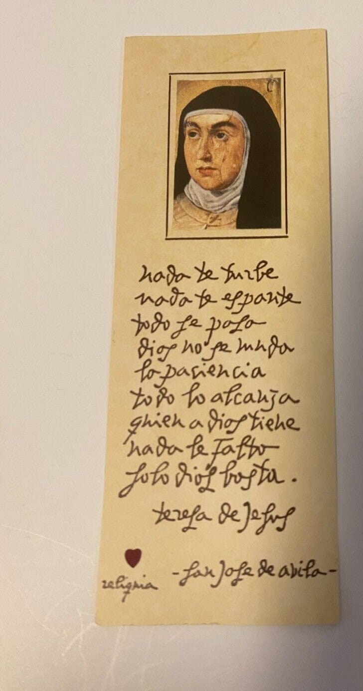 Santa Teresa de Avila prayer card with relic, Christian religious collectible by Bob and Penny Lord, featuring a detailed image of the saint.