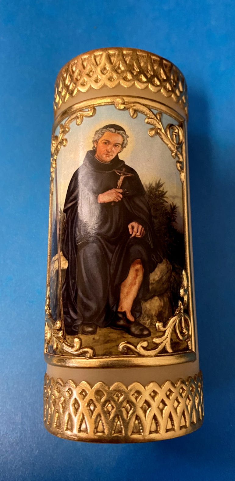 Small devotional candle by Will & Baumer featuring an image of Saint Peregrine, ideal for home and spiritual ambiance.