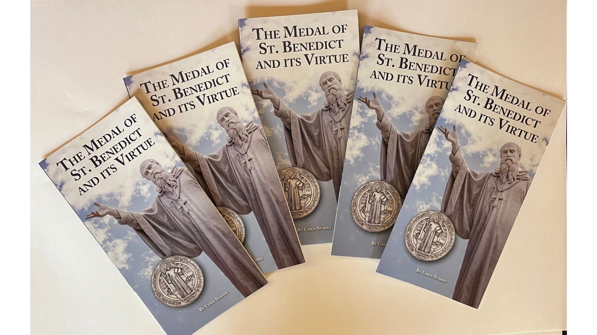 St. Benedict Medal Prayer Pamphlet from Bob and Penny Lord, featuring a five-panel Holy Card with religious imagery and prayer text.