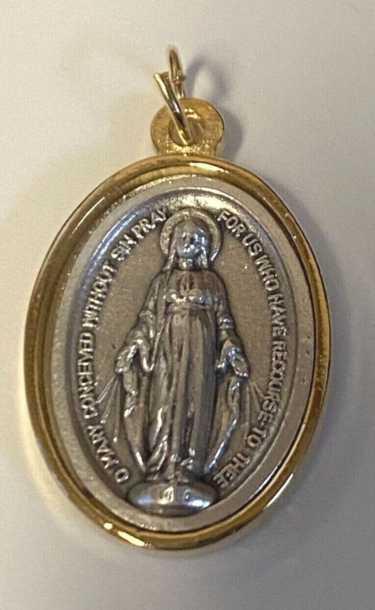 Gold and silver tone St. Michael and Our Lady of Guadalupe medals, religious Christian collectibles by Bob and Penny Lord.
