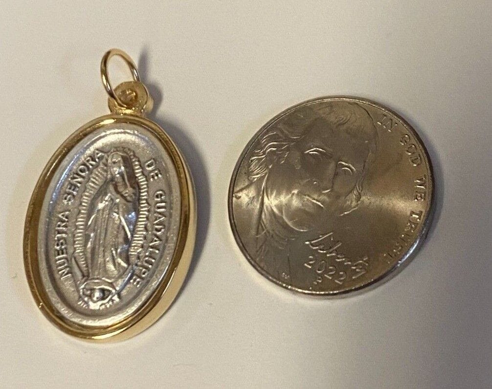 Gold and silver tone St. Michael Miraculous Medal with Our Lady of Guadalupe, religious Christian jewelry collectible by Bob and Penny Lord.