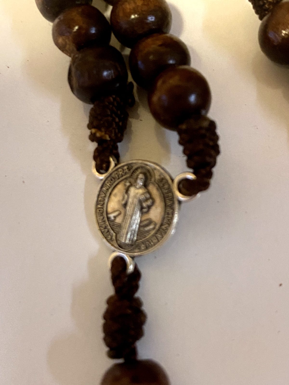 Wood rosary box with Saint Maximilian Kolbe design and rosary beads, from Colombia, by Bob and Penny Lord.