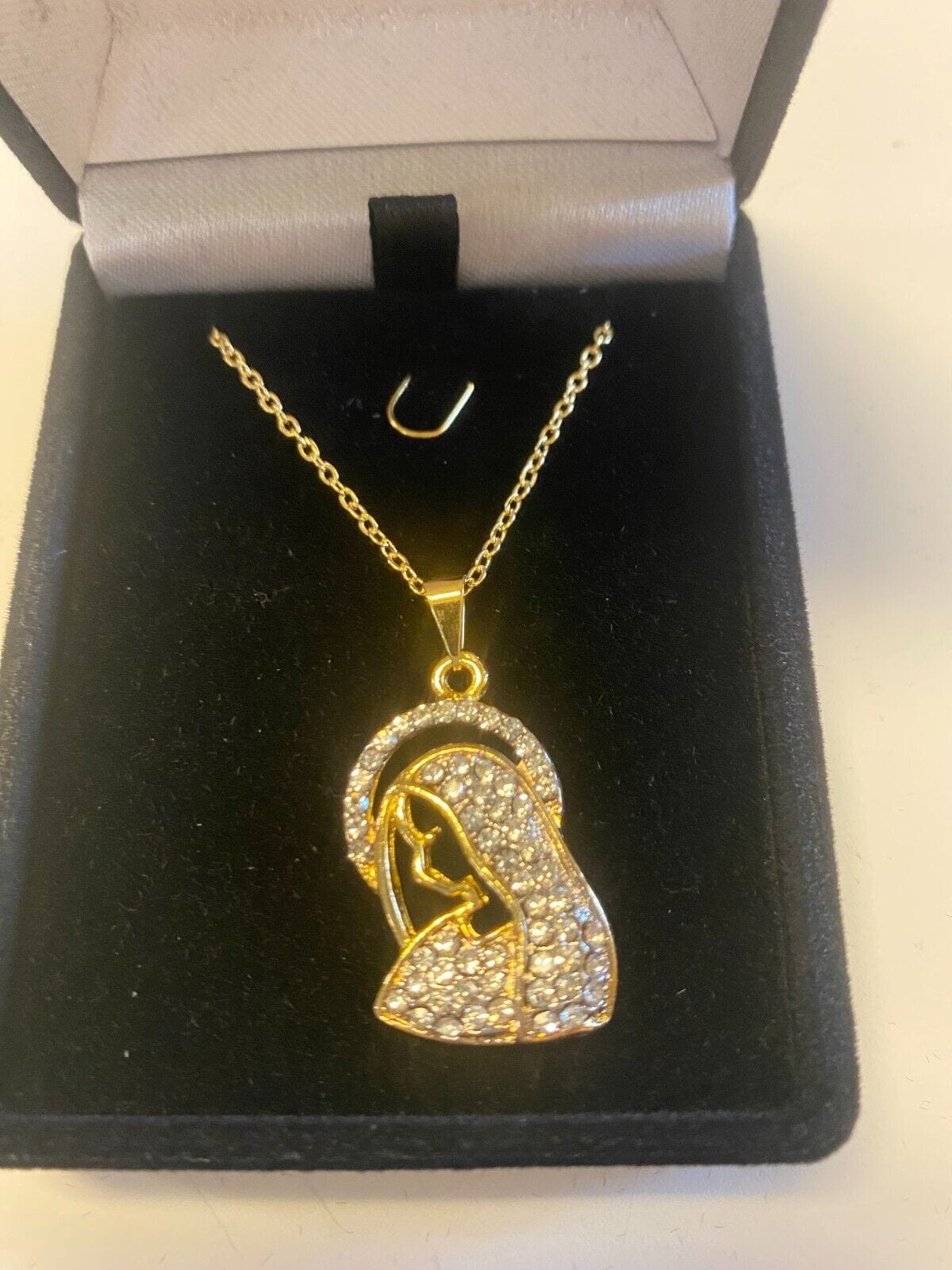 Brazilian gold-plated Blessed Mother necklace, 20-inch length, fashion jewelry pendant with detailed religious design.