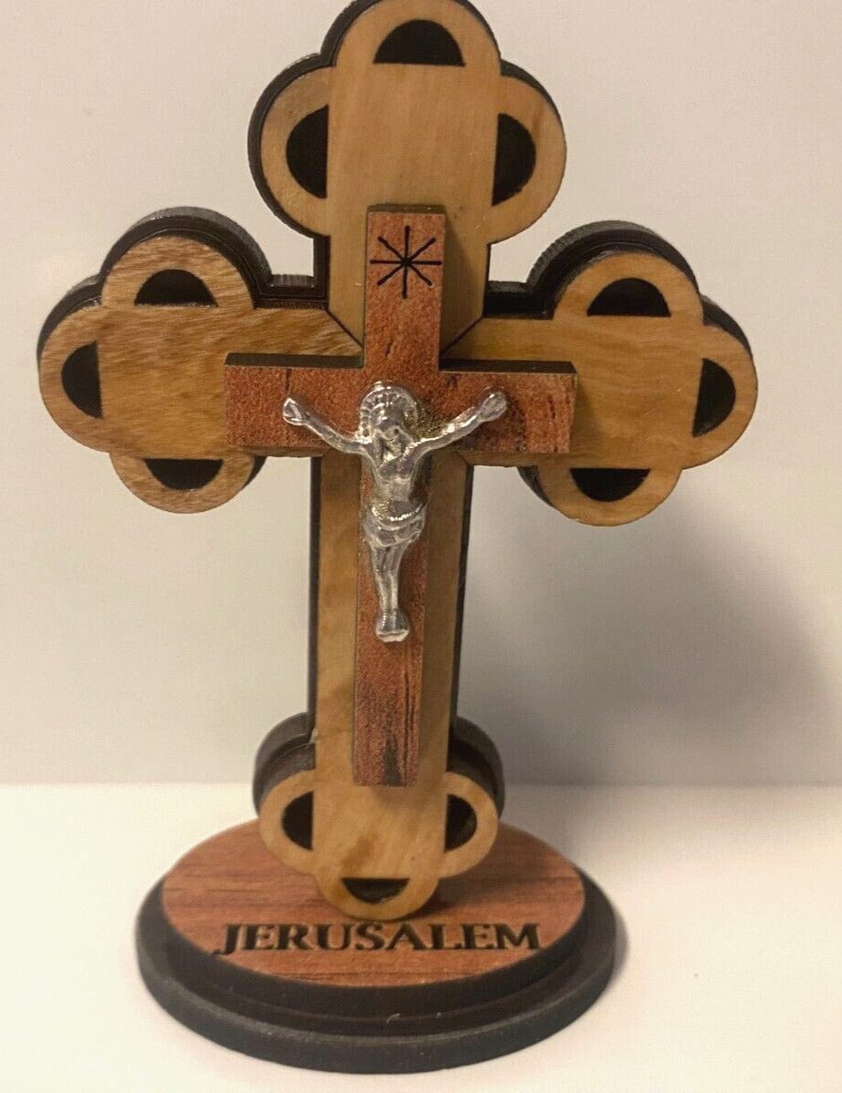 Olive wood and mother of pearl crucifix, 3.75 inches, featuring detailed craftsmanship from Bethlehem, suitable for religious collectibles.