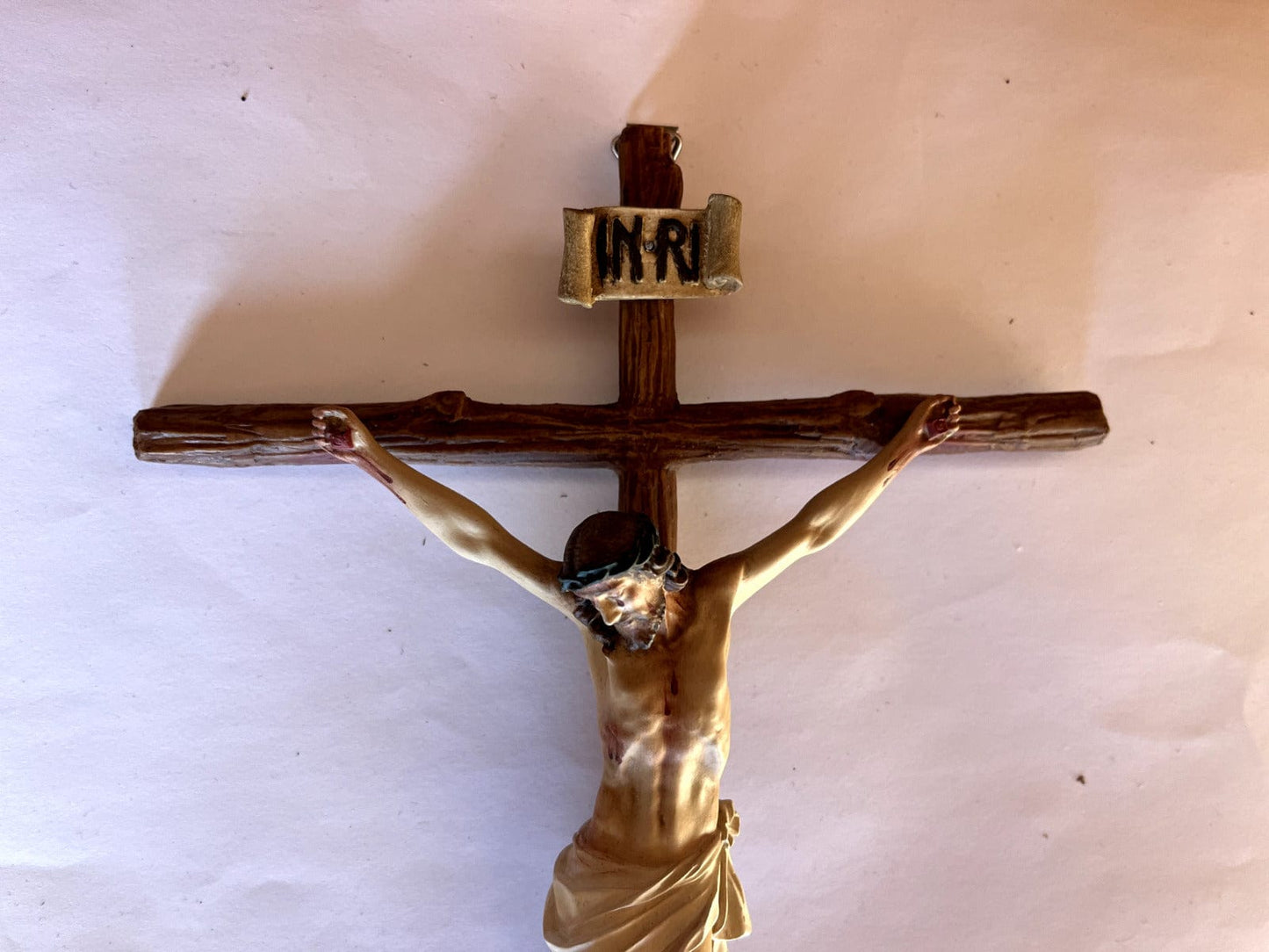 Handmade 11-inch Colombian crucifix from Bob and Penny Lord, featuring detailed Christian religious symbolism.