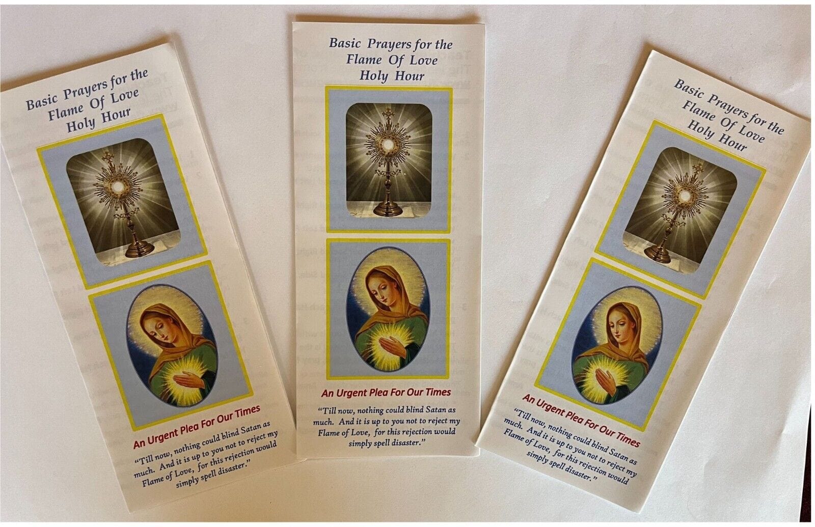Three Flame of Love Holy Hour trifold holy cards by Bob and Penny Lord featuring religious imagery and Christian spiritual symbols.