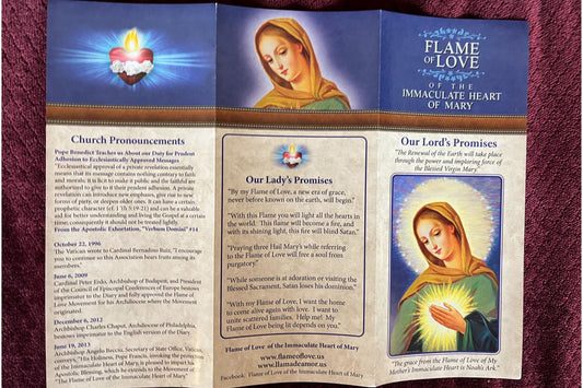 Front view of Bob and Penny Lord's Flame of Love Prayer Trifold with religious imagery and prayer details inside.